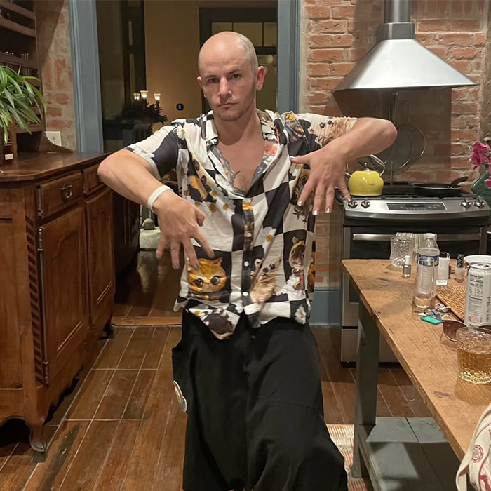 Congressional candidate in a cat-print shirt, karma for attacking beachgoer.