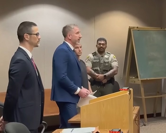 A congressional candidate in court, facing karma for attacking a beachgoer.