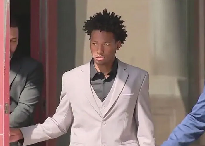 Karmelo Anthony walking through a doorway with his legal team, amid new disturbing evidence. Karmelo Anthony walking through a doorway with his legal team, amid new disturbing evidence.