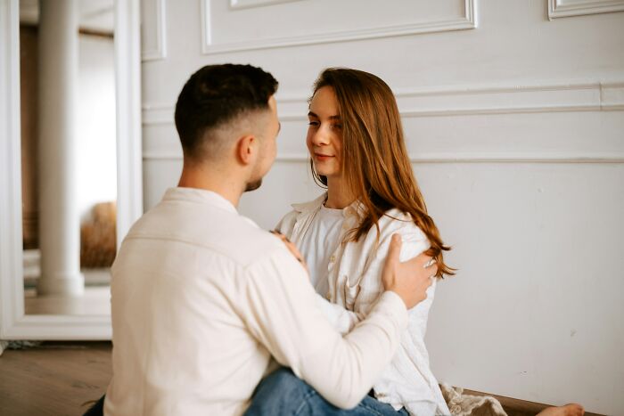 A loving married couple embracing and looking into each other's eyes, experiencing truths about being married.