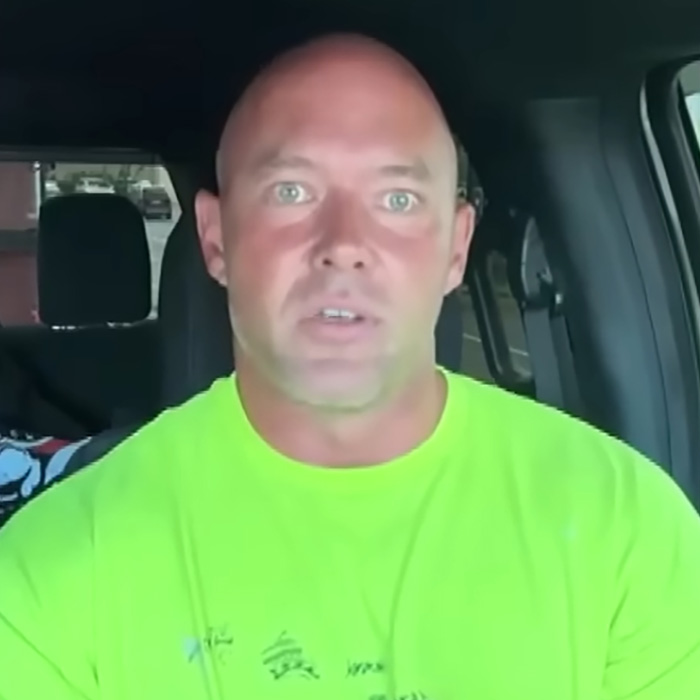 A congressional candidate looking surprised, highlighting the karma he faces after attacking a beachgoer.