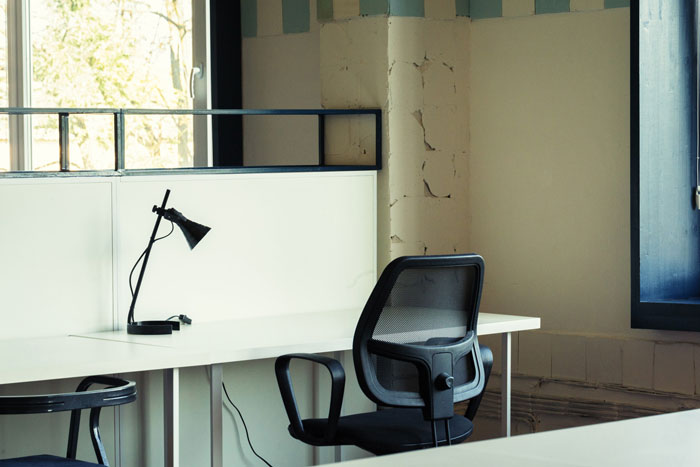 Empty office space, symbolizing a man not showing up to work for 6 years before being caught. Empty office space, symbolizing a man not showing up to work for 6 years before being caught.