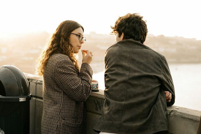 A couple talks outdoors, sharing thoughts about the truths about being married.