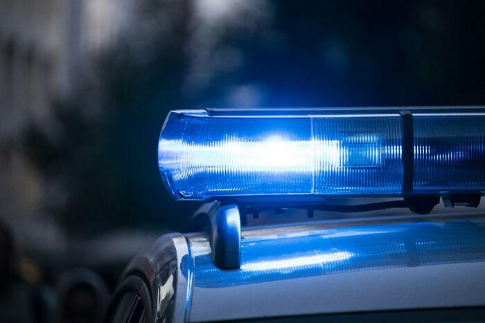 Flashing blue police car lights, often associated with worst wedding moments.