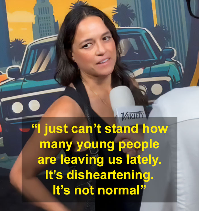 Michelle Rodriguez speaking into a microphone, applauded for pointing out troubling patterns among young people.