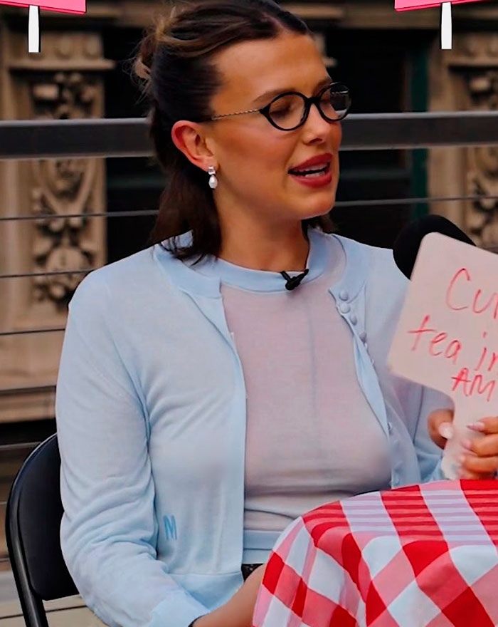 Millie Bobby Brown wearing glasses, discussing weight loss transformation during an interview. Millie Bobby Brown wearing glasses, discussing weight loss transformation during an interview.