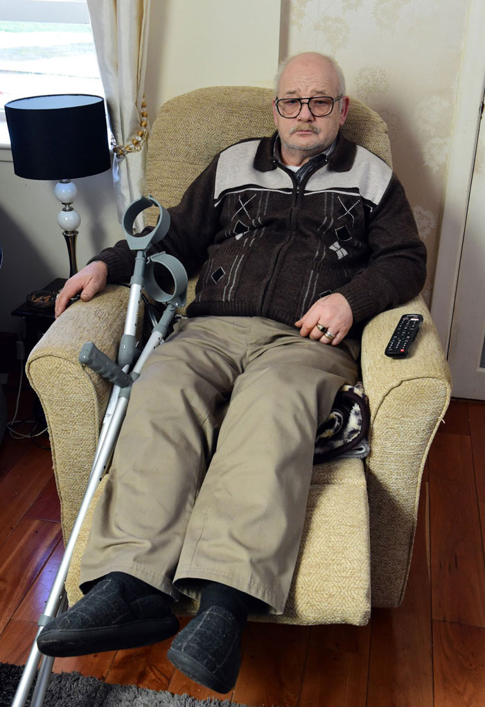 A lottery winner sitting in a chair with crutches, contemplating his pension and spent lottery winnings. A lottery winner sitting in a chair with crutches, contemplating his pension and spent lottery winnings.