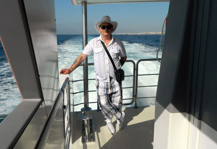 A lottery winner enjoying holidays after blowing a large sum on family gifts and travel. A lottery winner enjoying holidays after blowing a large sum on family gifts and travel.