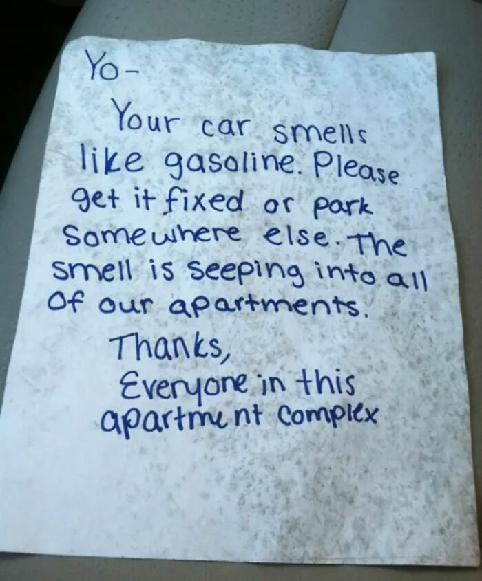 A note requesting a neighbor fix their car's gasoline smell that is seeping into apartments. Jerk neighbors and parking.