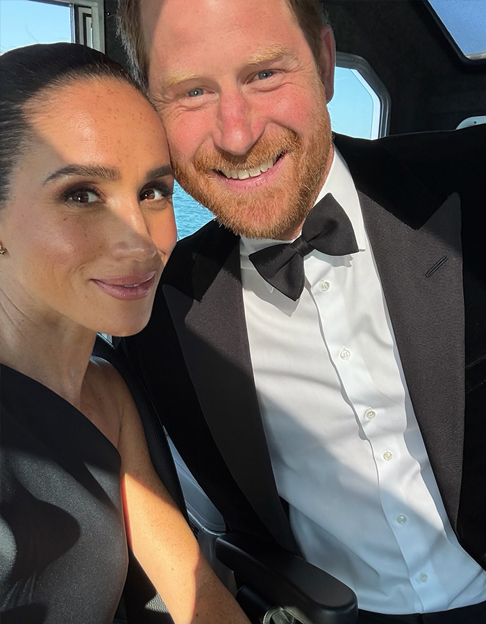 Prince Harry and Meghan Markle smiling, possibly related to financial aid discussions for their UK move. Prince Harry and Meghan Markle smiling, possibly related to financial aid discussions for their UK move.