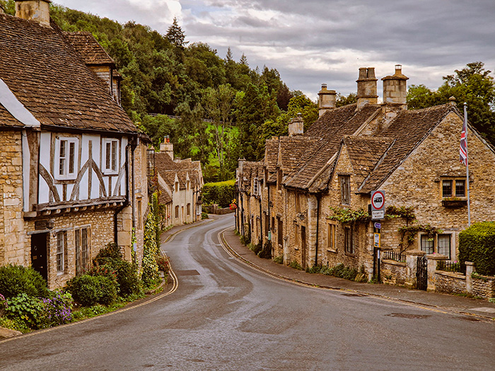 Charming village street with traditional stone houses, reflecting the UK for Prince Harry and Meghan Markle's move. Charming village street with traditional stone houses, reflecting the UK for Prince Harry and Meghan Markle's move.