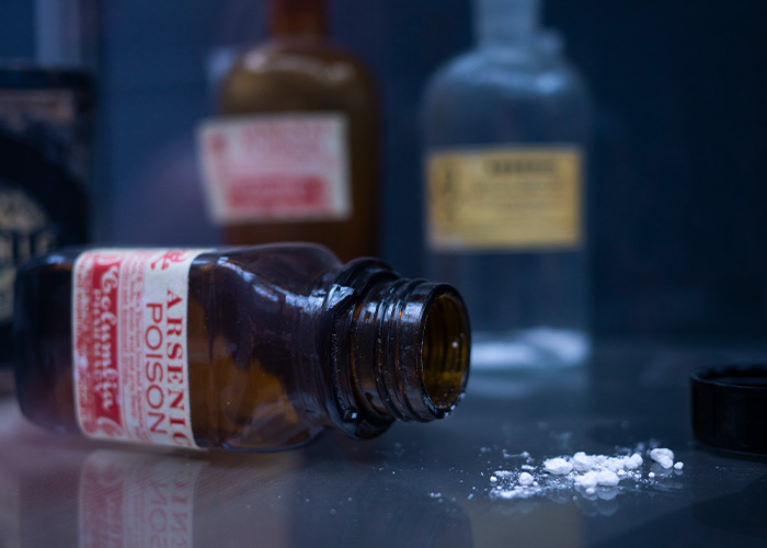 An arsenic poison bottle, exposing a nurse's aide's horrific crimes and patient autopsy truth. An arsenic poison bottle, exposing a nurse's aide's horrific crimes and patient autopsy truth.
