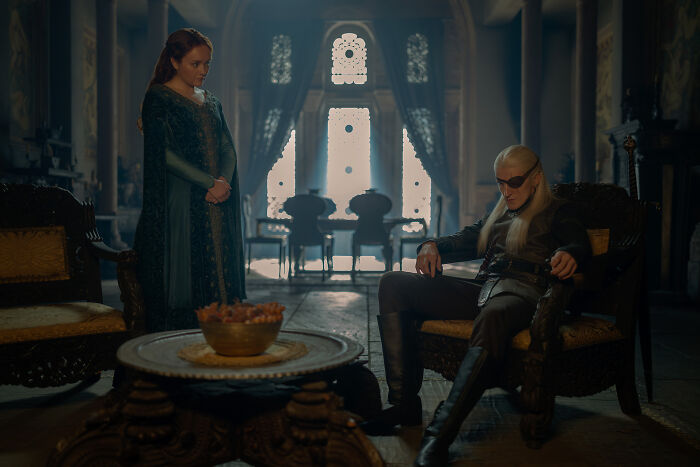 A dramatic intimate scene with characters from House of the Dragon, fueling boycott threats. A dramatic intimate scene with characters from House of the Dragon, fueling boycott threats.