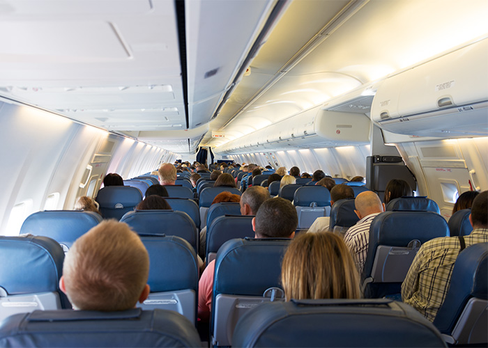 Passengers on plane, illustrating the setting for the peanuts on plane discussion. Passengers on plane, illustrating the setting for the peanuts on plane discussion.