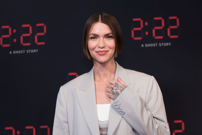 Ruby Rose smiling on the red carpet, symbolizing evolving identity and the term Almondsexual. Ruby Rose smiling on the red carpet, symbolizing evolving identity and the term Almondsexual.