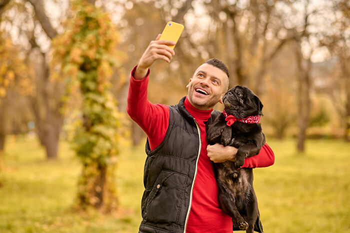 A man takes a selfie with a pug, unaware his affairs might come to light in a brutal way.