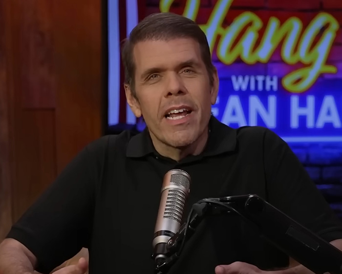 A man speaking into a microphone, likely about the How I Met Your Mother star's controversy.