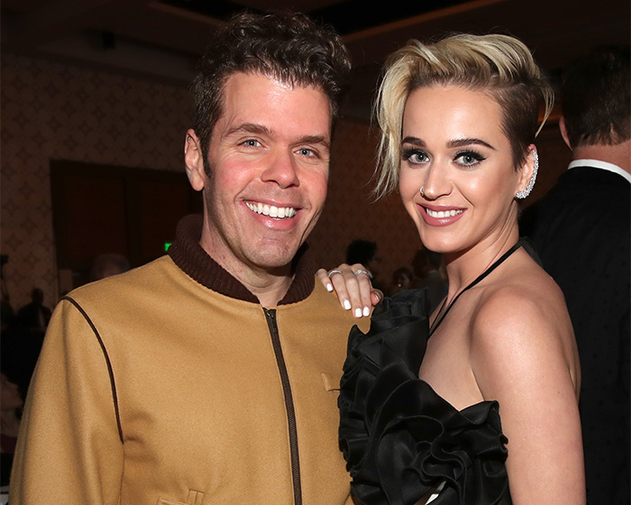 Perez Hilton smiling next to Katy Perry, a celebrity blogger facing a heartbreaking question from his hospital bed.