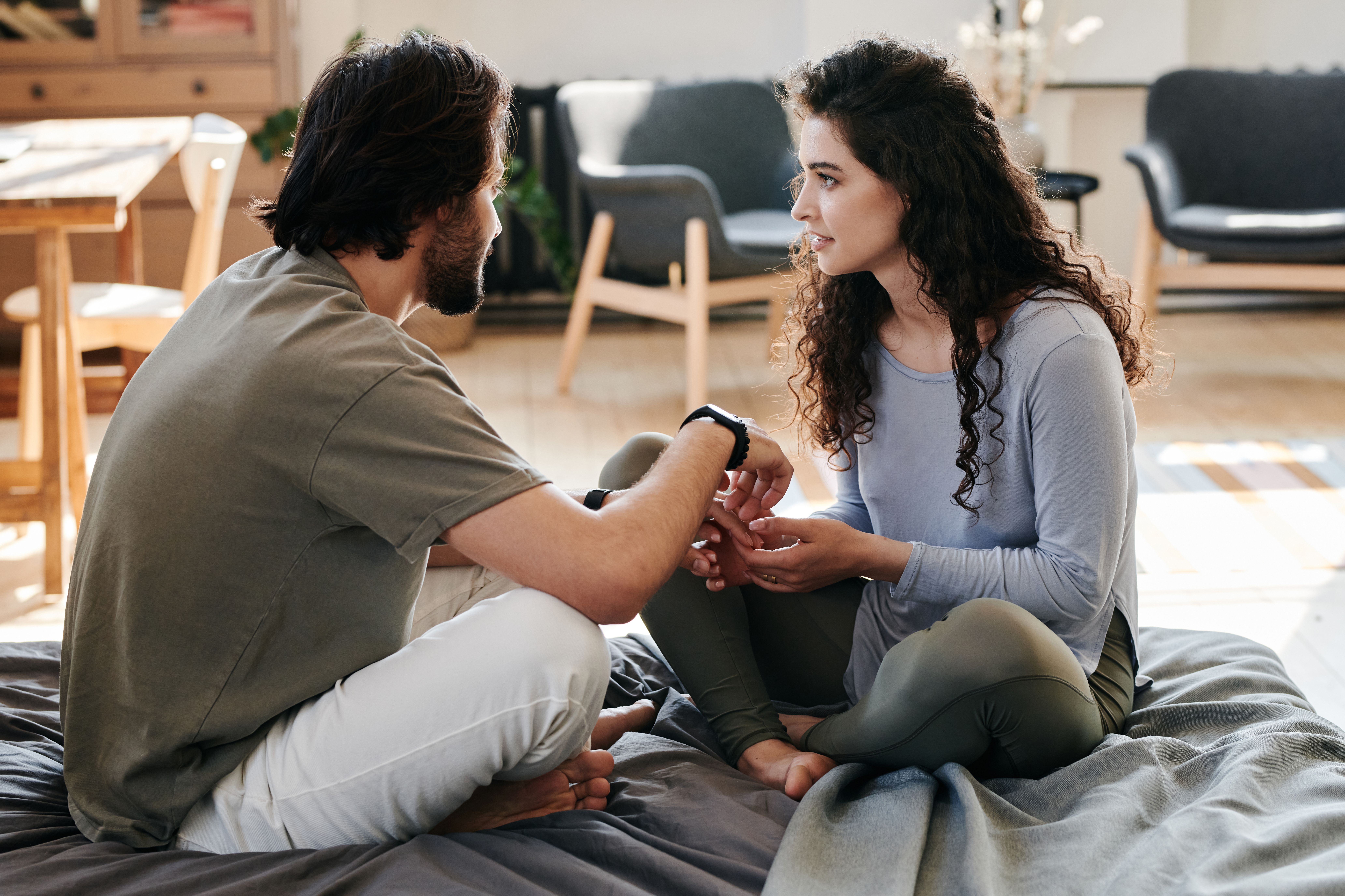 A man and his fiancée sitting and talking, discussing the fancy laptop in her closet and internet theories. A man and his fiancée sitting and talking, discussing the fancy laptop in her closet and internet theories.