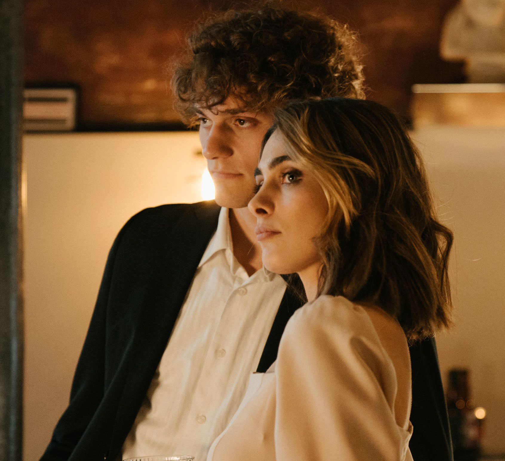 A couple looking concerned, after promising wedding dinner but only serving appetizers, starting a hunger fight. A couple looking concerned, after promising wedding dinner but only serving appetizers, starting a hunger fight.