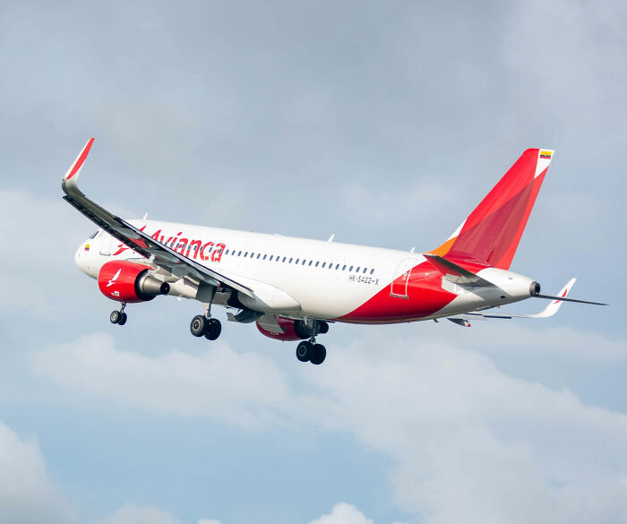 Avianca airline plane in flight. Airline hands influencer sweet karma after a mid-flight prank.