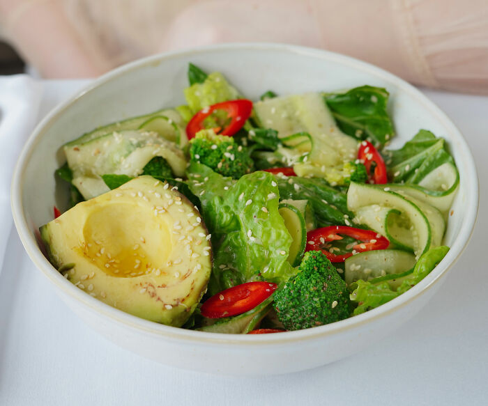 A next-level school lunch salad with avocado, broccoli, and red peppers, highlighting French school lunch. A next-level school lunch salad with avocado, broccoli, and red peppers, highlighting French school lunch.