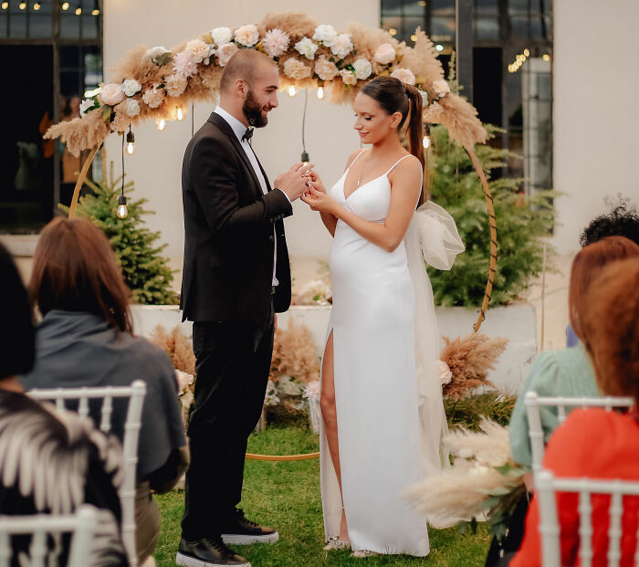 A newly married couple at an outdoor ceremony, relating to the man who married his cousin seeking advice. A newly married couple at an outdoor ceremony, relating to the man who married his cousin seeking advice.