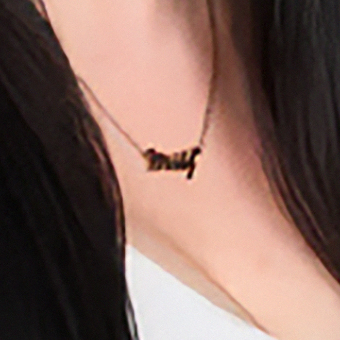 A close-up of a provocative necklace worn by a politician, a key element in her campaign poster. A close-up of a provocative necklace worn by a politician, a key element in her campaign poster.
