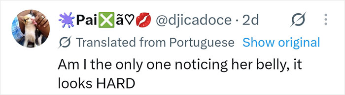 Screenshot of a social media comment in Portuguese, translated to English, about the pregnant influencer's belly.
