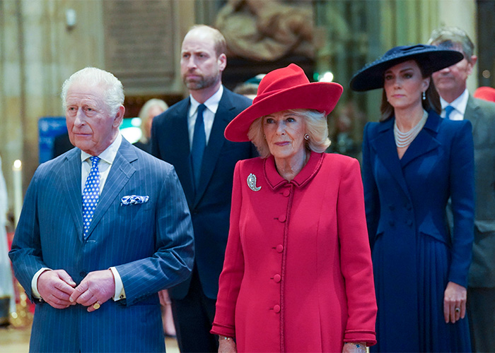 King Charles, Queen Camilla, Prince William, and Kate Middleton at a formal event where a name change was discussed.
