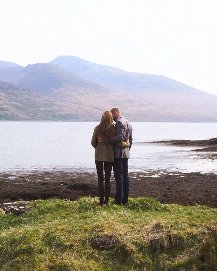 Prince William and Kate Middleton embrace by a lake with mountains in the background, examining their marriage. Prince William and Kate Middleton embrace by a lake with mountains in the background, examining their marriage.