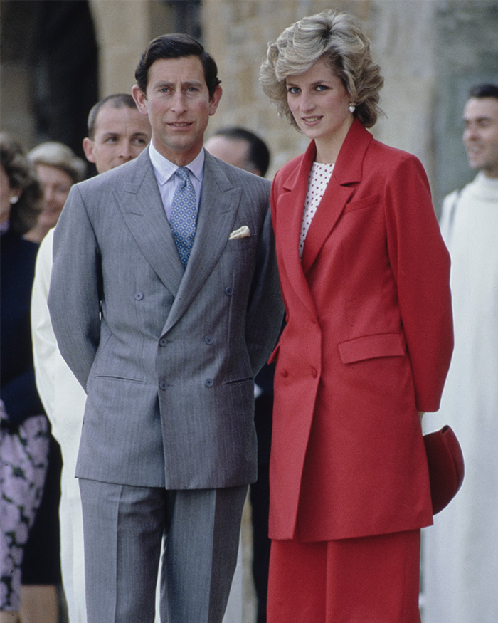 Princess Diana and Prince Charles, a royal couple, posing together in their younger years. Princess Diana and Prince Charles, a royal couple, posing together in their younger years.