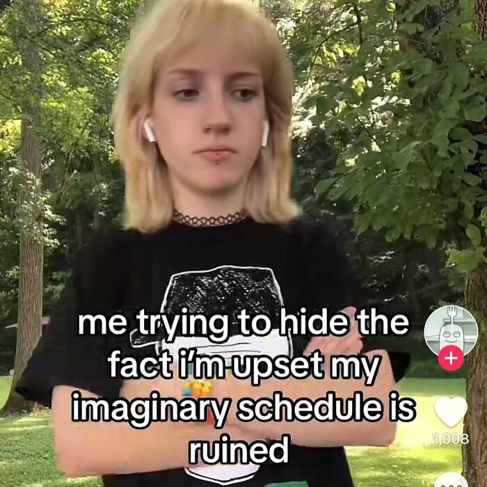 A person in a black t-shirt with text: me trying to hide the fact I'm upset my imaginary schedule is ruined. Hilarious meme.