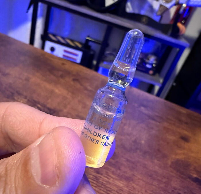 Vial with a warning label. The influencer's mid-flight prank resulted in sweet karma from the airline.