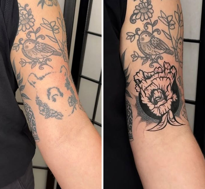 A faded tattoo regret of an animal's face surrounded by flowers transformed into a bold floral cover-up with existing bird tattoos.