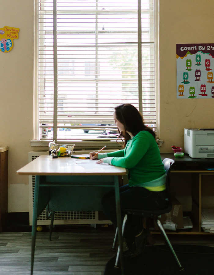 Woman in a classroom, representing the kidnapping survivor before she lost her life. Woman in a classroom, representing the kidnapping survivor before she lost her life.