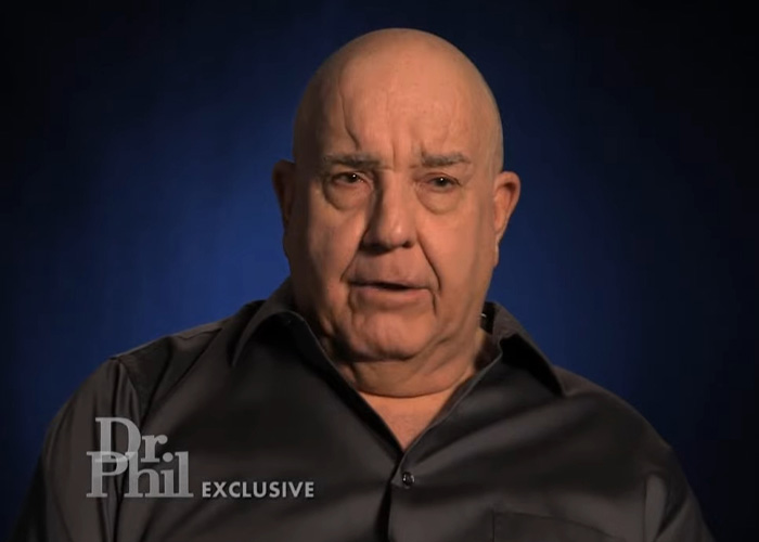 An older man in a black shirt, labeled Dr. Phil Exclusive, discussing the kidnapping and loss of life. An older man in a black shirt, labeled Dr. Phil Exclusive, discussing the kidnapping and loss of life.