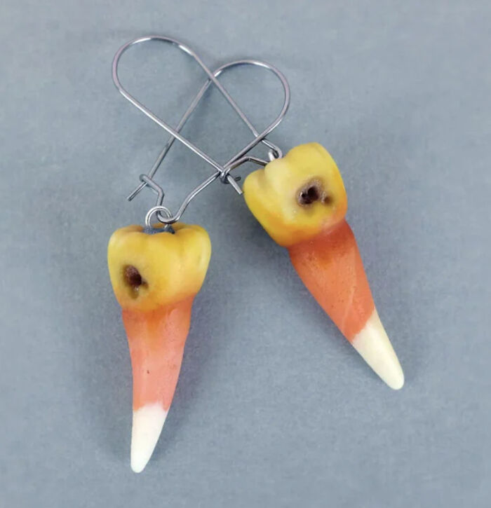 Earrings shaped like teeth, a disturbing level of skill for an awful idea.