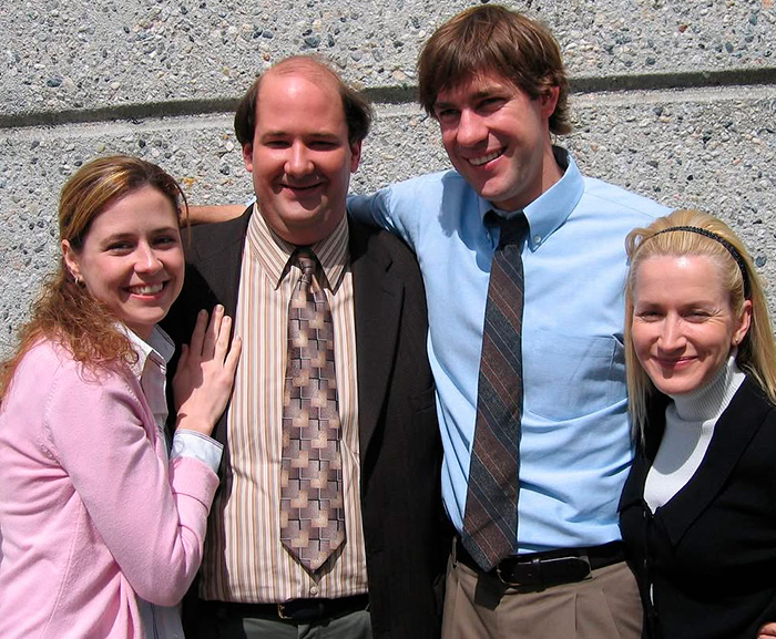 The Office stars Jenna Fischer, Brian Baumgartner, John Krasinski, and Angela Kinsey smile. The Office stars Jenna Fischer, Brian Baumgartner, John Krasinski, and Angela Kinsey smile.