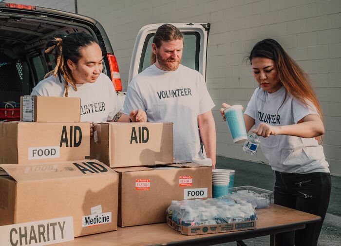 America does better with humanitarian aid, with volunteers organizing boxes of food, medicine, and water.