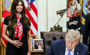 Mystery Woman Behind Trump Goes Viral After One Strange Gesture Sparks A Wild Theory