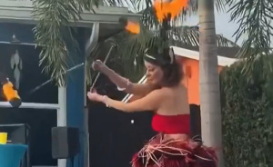Woman's Skirt Catch Fire Mid-Performance, But Man's Split-Second 'Executive Decision' Is Going Viral