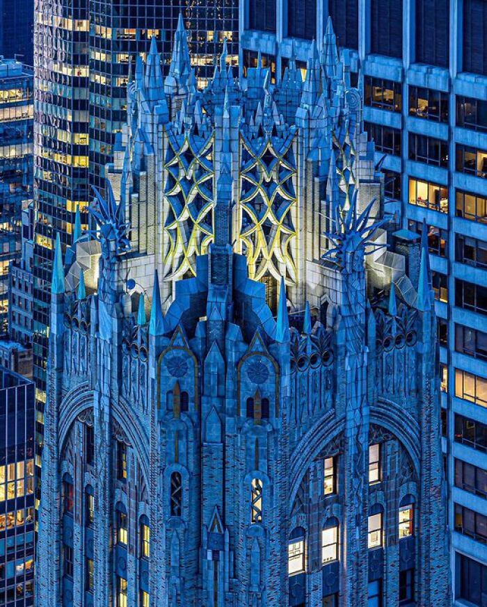 An ornate, blue art deco building with intricate designs, highlighting buildings with so much character.