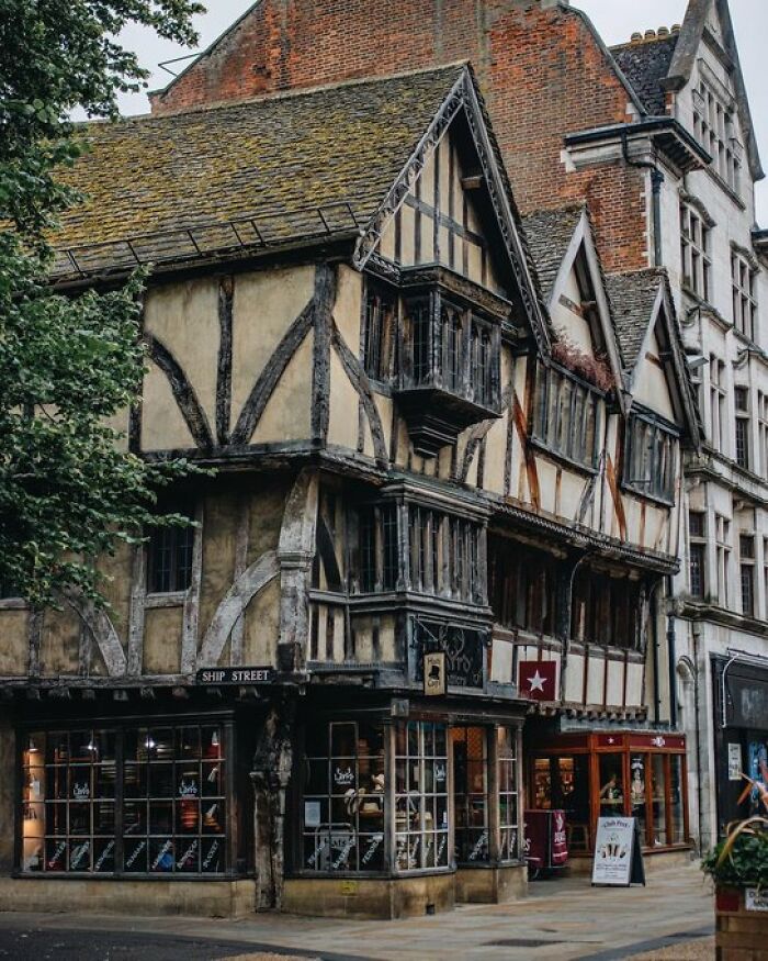 Historic, half-timbered building with character on Ship Street, showcasing classic architectural details and shopfronts.
