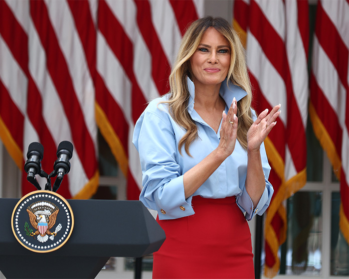 Melania Trump appears to turn on Natalie Harp with humiliating move amid scandal, clapping in front of flags. Melania Trump appears to turn on Natalie Harp with humiliating move amid scandal, clapping in front of flags.