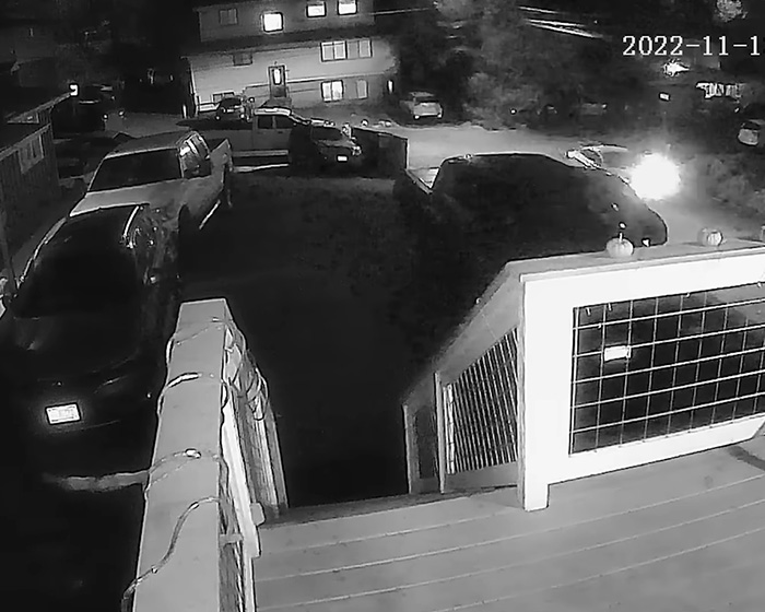 Nighttime surveillance footage of the house targeted by Bryan Kohberger, showing parked cars and the exterior. Nighttime surveillance footage of the house targeted by Bryan Kohberger, showing parked cars and the exterior.