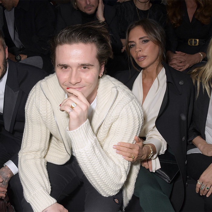 Brooklyn Beckham and Victoria Beckham sitting together. Excruciating wedding, Beckhams family shattered, crime scene morning after. Brooklyn Beckham and Victoria Beckham sitting together. Excruciating wedding, Beckhams family shattered, crime scene morning after.