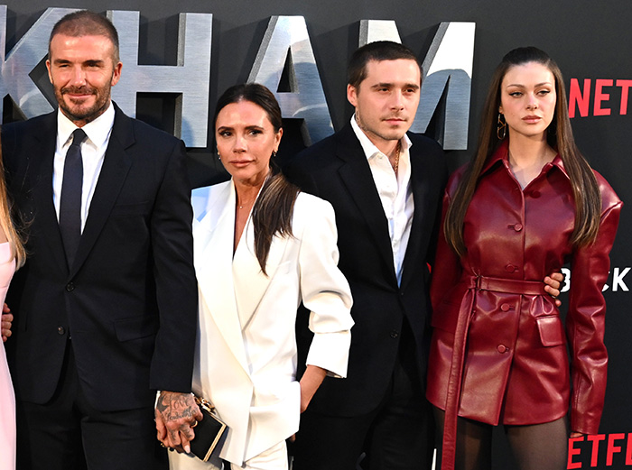 The Beckhams attending an event, revealing the family dynamic around the wedding. The Beckhams attending an event, revealing the family dynamic around the wedding.