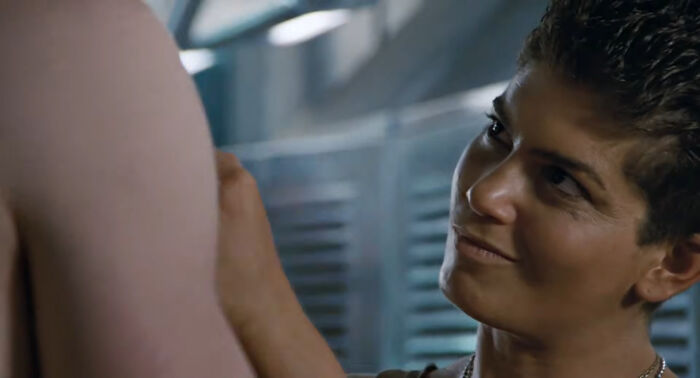 A woman with short hair looking intently at someone off-screen. She has a determined expression. Epic comebacks.