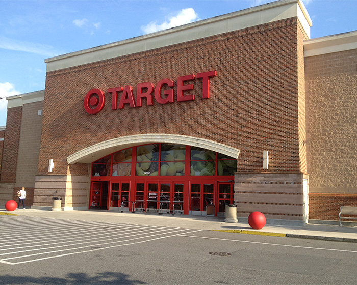 A Target store exterior, showing the main entrance and red logo, related to a racist costume backlash. A Target store exterior, showing the main entrance and red logo, related to a racist costume backlash.
